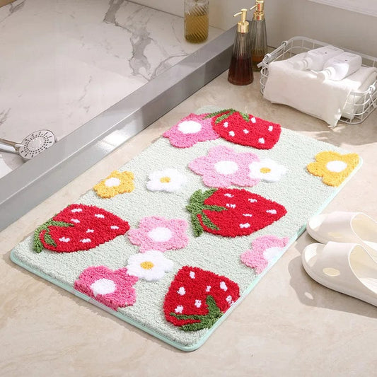 BerryBloom playful bath mat in strawberry shape from Ymonde