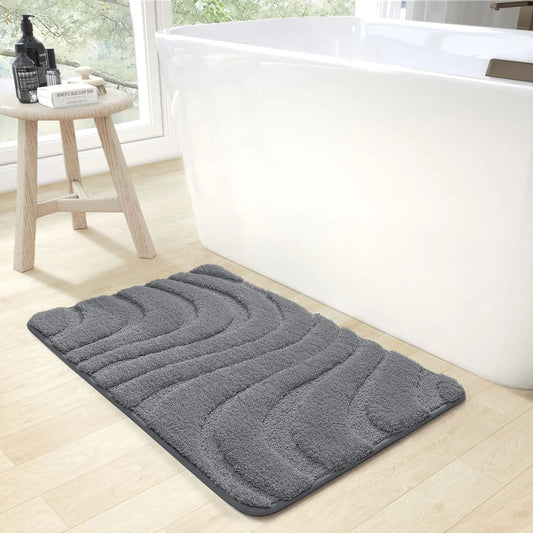 GreyWave dunkelgrauer Luxus-Badeteppich mit Antirutsch von Ymonde für das moderne Badezimmer.