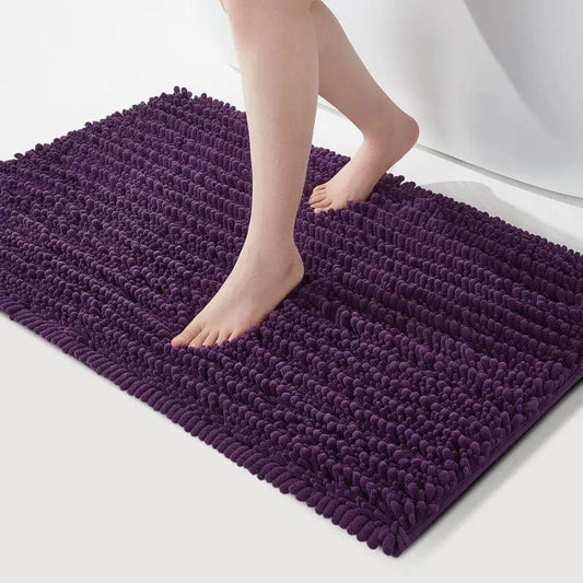 PurpleDry dark purple bath mat with non-slip and soft structure from Ymonde