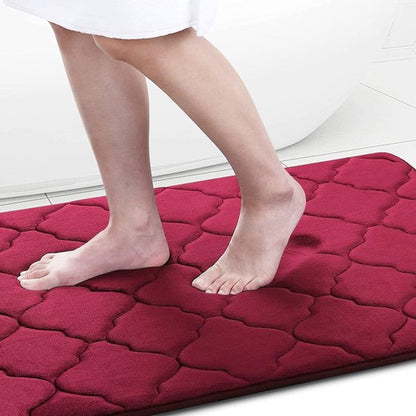Bordeaux red RubyNest bath mat with memory foam and soft microfiber anti-slip from Ymonde