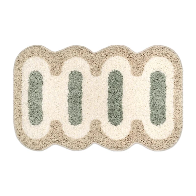 WaveMath green and cream cotton bath mat with wavy edge