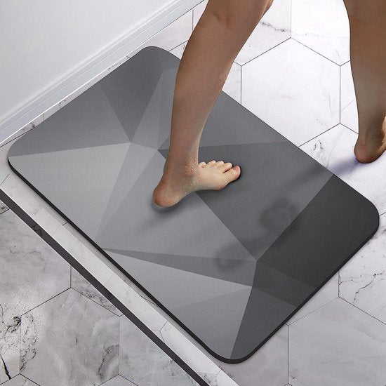 Gray bath mat 50x80 cm soft, water-absorbing, quick-drying with anti-slip from Ymonde
